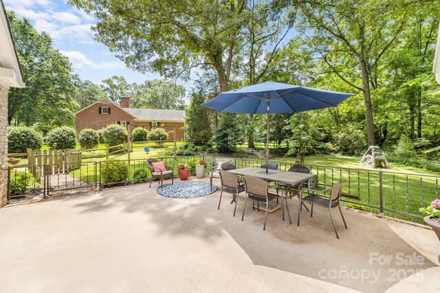 120 Labans Ln, Lincolnton, NC 28092 - view of patio featuring outdoor dining space and view of scattered trees