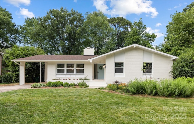 4017 Sulkirk Rd, Charlotte, NC 28210 - view of front of property featuring brick siding, a front yard, and a chimney