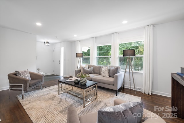 4017 Sulkirk Rd, Charlotte, NC 28210 - living area featuring baseboards, wood finished floors, and recessed lighting