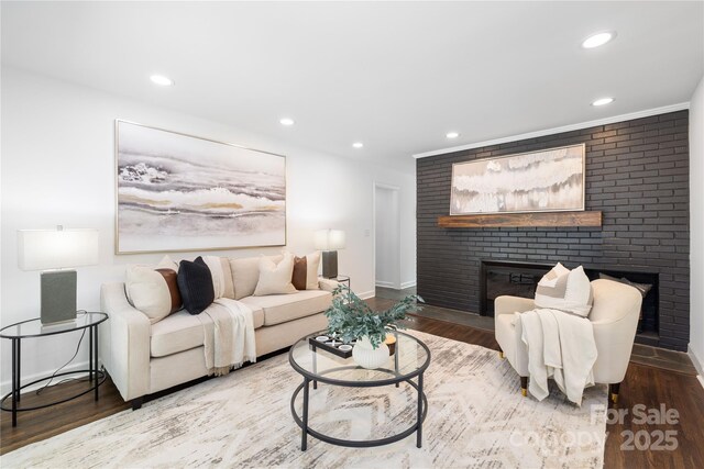 4017 Sulkirk Rd, Charlotte, NC 28210 - living room featuring a fireplace, wood finished floors, recessed lighting, and baseboards