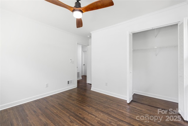 4017 Sulkirk Rd, Charlotte, NC 28210 - unfurnished bedroom featuring ornamental molding, wood finished floors, a closet, baseboards, and ceiling fan