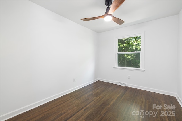 4017 Sulkirk Rd, Charlotte, NC 28210 - empty room with dark wood-style flooring, baseboards, and a ceiling fan