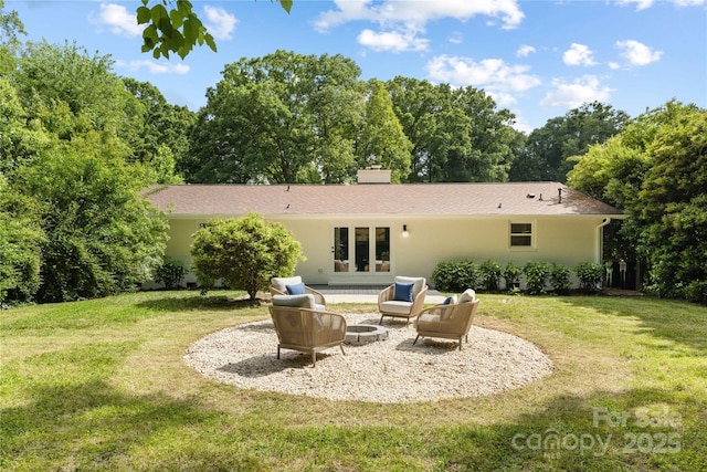 4017 Sulkirk Rd, Charlotte, NC 28210 - back of house featuring a lawn, a chimney, a patio area, and stucco siding