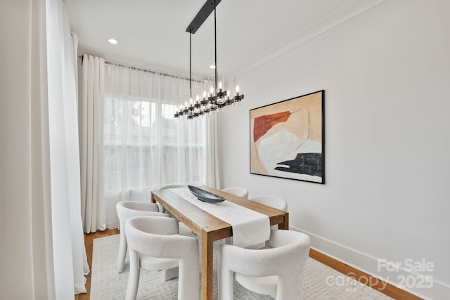 621 Poindexter Dr, Charlotte, NC 28209 - dining space featuring wood finished floors, baseboards, a chandelier, and recessed lighting