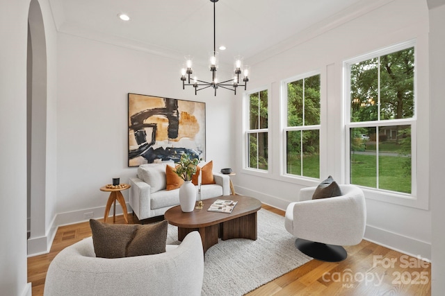 621 Poindexter Dr, Charlotte, NC 28209 - sitting room featuring a chandelier, plenty of natural light, crown molding, baseboards, and recessed lighting