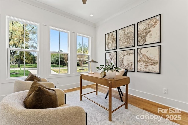 621 Poindexter Dr, Charlotte, NC 28209 - home office with healthy amount of natural light, baseboards, light wood-style flooring, and ornamental molding