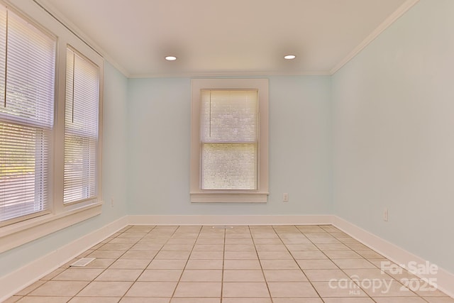 102 Lake Dr, Hickory, NC 28601 - spare room featuring crown molding, light tile patterned floors, recessed lighting, and baseboards