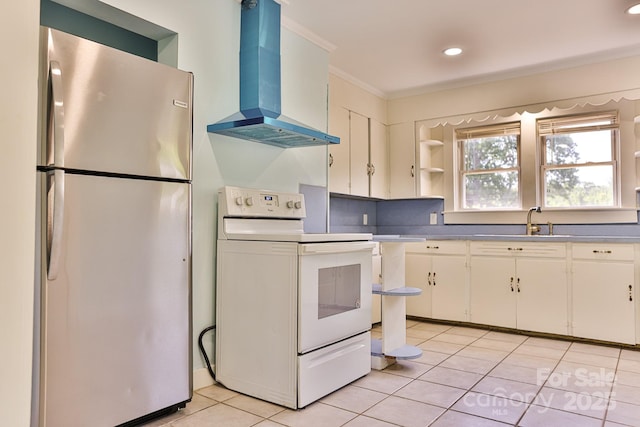 102 Lake Dr, Hickory, NC 28601 - kitchen featuring freestanding refrigerator, white range with electric cooktop, island range hood, crown molding, and a sink