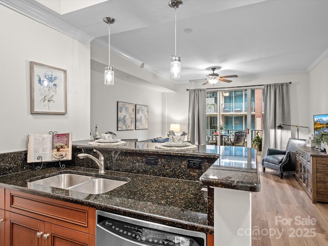 300 W 5th St Unit 433, Charlotte, NC 28202 - kitchen with stainless steel dishwasher, a sink, crown molding, open floor plan, and brown cabinets