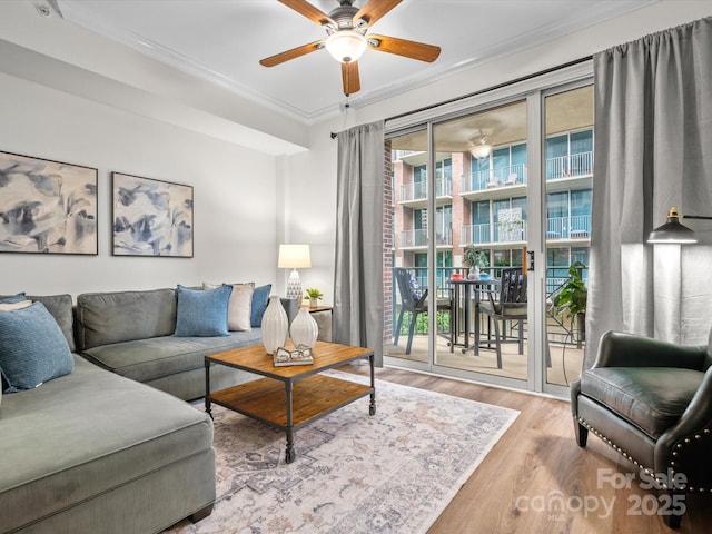 300 W 5th St Unit 433, Charlotte, NC 28202 - living room with ceiling fan, wood finished floors, and crown molding