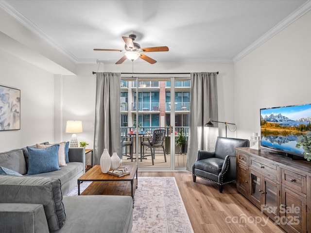 300 W 5th St Unit 433, Charlotte, NC 28202 - living room featuring a ceiling fan, light wood finished floors, and ornamental molding