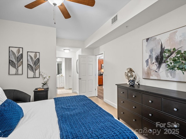 300 W 5th St Unit 433, Charlotte, NC 28202 - bedroom with ensuite bath and ceiling fan