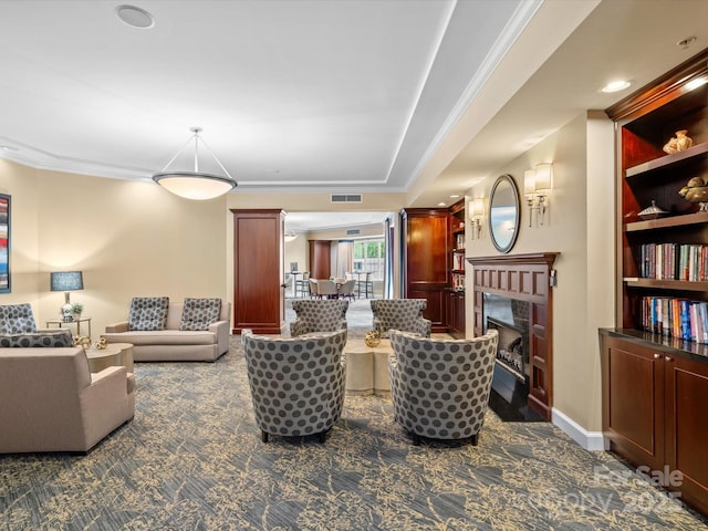 300 W 5th St Unit 433, Charlotte, NC 28202 - living room with a fireplace, dark carpet, crown molding, and baseboards