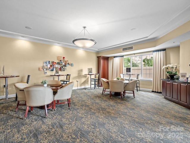 300 W 5th St Unit 433, Charlotte, NC 28202 - dining area with ornamental molding, carpet flooring, and baseboards