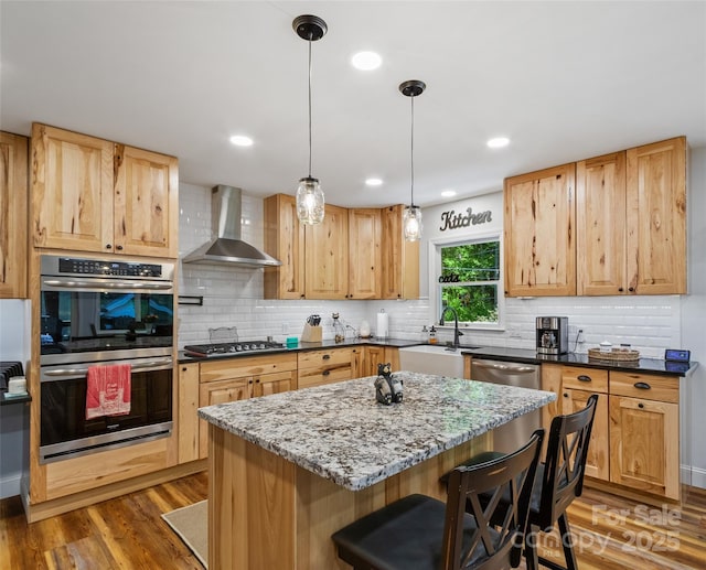 1493 Upper Browns Creek Rd, Burnsville, NC 28714 - kitchen with wall chimney range hood, appliances with stainless steel finishes, a sink, dark stone counters, and tasteful backsplash