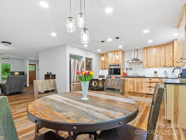 1493 Upper Browns Creek Rd, Burnsville, NC 28714 - dining room featuring light wood-style flooring, recessed lighting, and a ceiling fan
