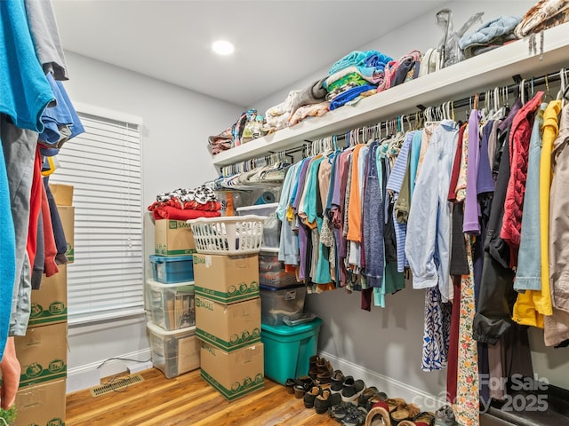 1493 Upper Browns Creek Rd, Burnsville, NC 28714 - walk in closet featuring wood finished floors