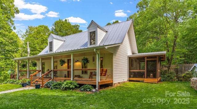 1493 Upper Browns Creek Rd, Burnsville, NC 28714 - view of front of property with a sunroom, metal roof, and a porch