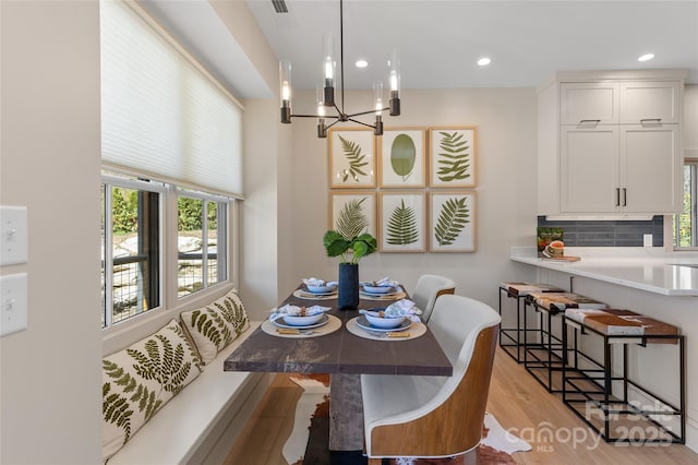 1081 Hicks Rd Unit B, Highlands, NC 28741 - dining area featuring healthy amount of natural light, a chandelier, light wood-style floors, and recessed lighting