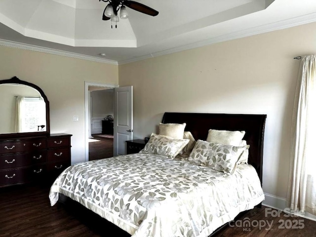 1108 Tarram Ct Unit 12, Lancaster, SC 29720 - bedroom featuring dark wood finished floors, a tray ceiling, and crown molding
