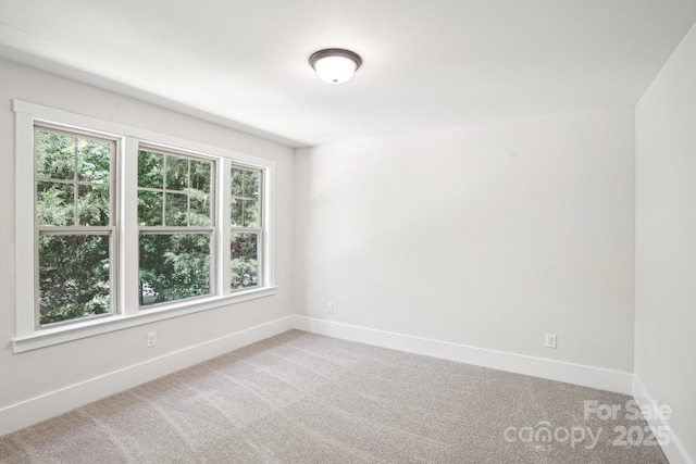 8521 Aspen Ct, Charlotte, NC 28227 - spare room featuring carpet and baseboards