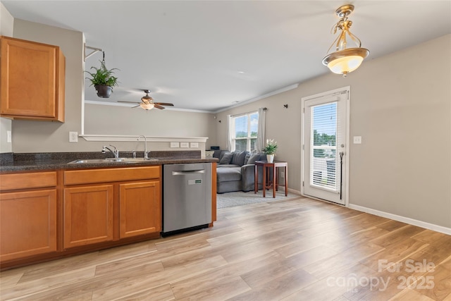 3996 Heather View Ln, Winston Salem, NC 27127 - kitchen featuring dishwasher, a sink, light wood-style floors, brown cabinetry, and ceiling fan
