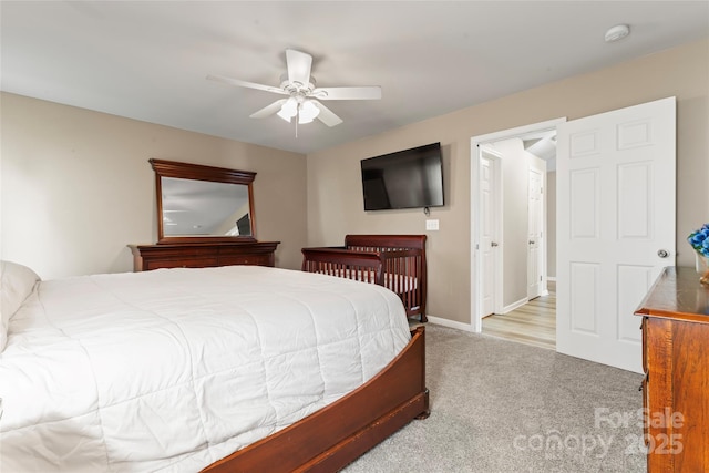 3996 Heather View Ln, Winston Salem, NC 27127 - carpeted bedroom with a ceiling fan and baseboards