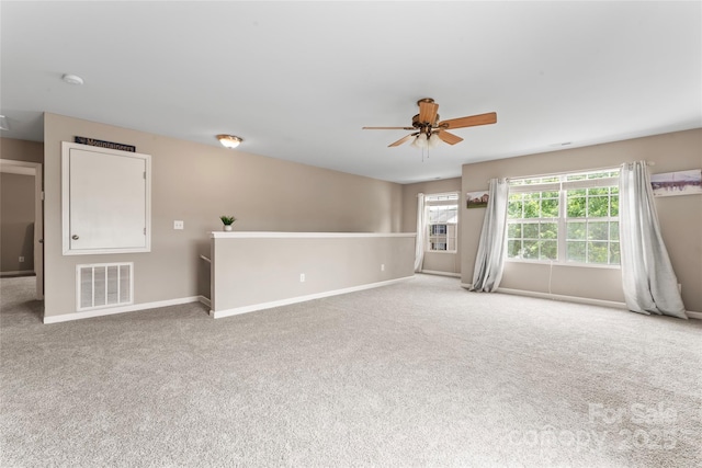 3996 Heather View Ln, Winston Salem, NC 27127 - carpeted empty room with baseboards and ceiling fan
