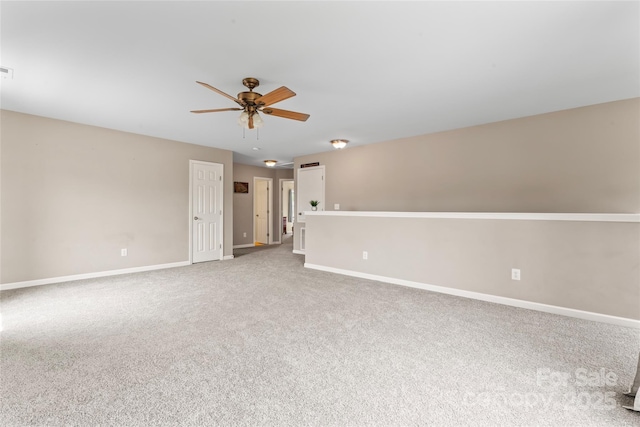 3996 Heather View Ln, Winston Salem, NC 27127 - unfurnished room with ceiling fan, baseboards, and light colored carpet