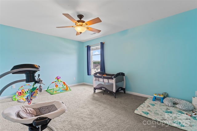 3996 Heather View Ln, Winston Salem, NC 27127 - rec room with carpet floors, a ceiling fan, and baseboards