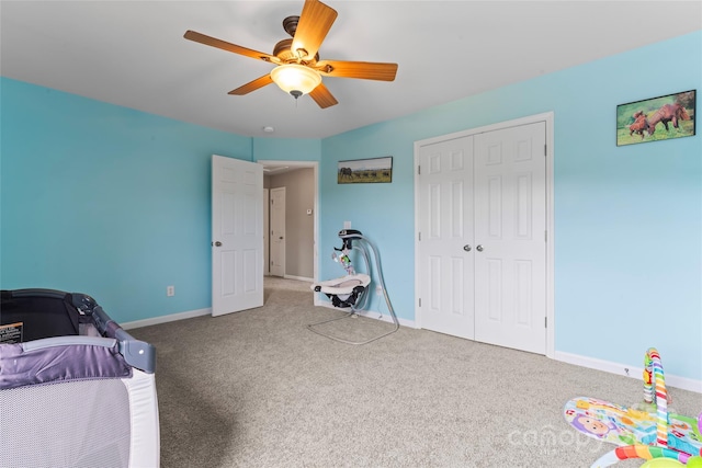 3996 Heather View Ln, Winston Salem, NC 27127 - bedroom with a closet, carpet floors, baseboards, and a ceiling fan