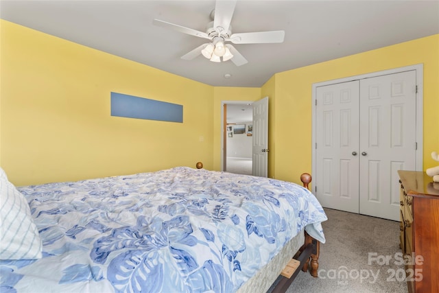 3996 Heather View Ln, Winston Salem, NC 27127 - carpeted bedroom featuring a closet and ceiling fan