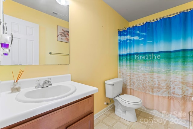 3996 Heather View Ln, Winston Salem, NC 27127 - full bathroom featuring vanity, toilet, a shower with curtain, and tile patterned floors