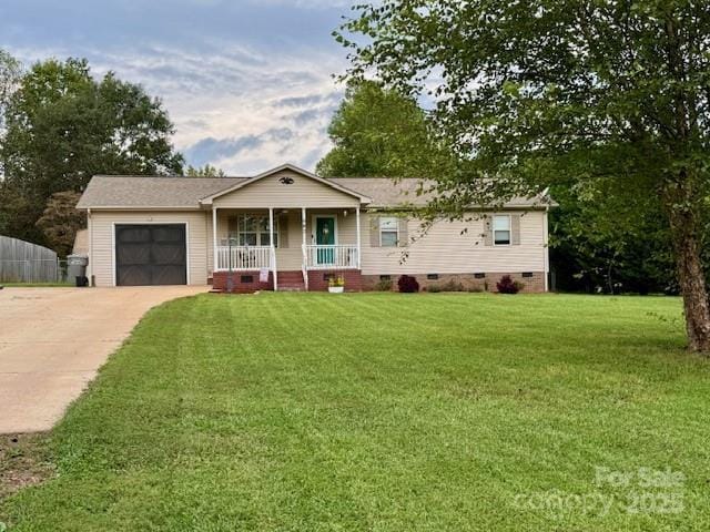 667 Blossom Hill Rd, Lincolnton, NC 28092 - view of front of property with crawl space, a porch, an attached garage, driveway, and a front lawn