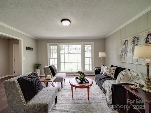 2666 Hill Ln, Gastonia, NC 28054 - living room featuring crown molding, wood finished floors, wood walls, and a textured ceiling