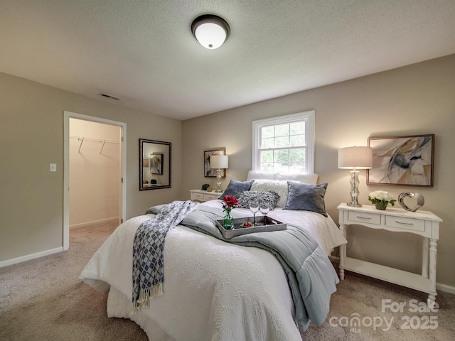 2666 Hill Ln, Gastonia, NC 28054 - bedroom with light carpet, baseboards, and a spacious closet