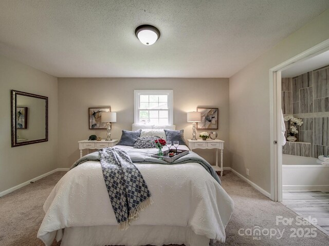 2666 Hill Ln, Gastonia, NC 28054 - bedroom with light carpet, baseboards, and a textured ceiling