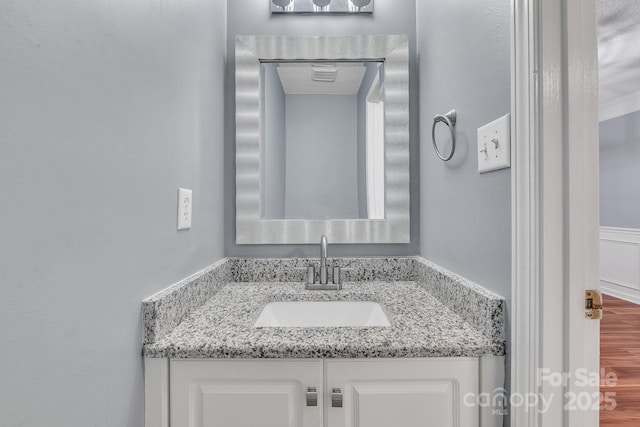 8120 Vermilion Dr, Charlotte, NC 28215 - bathroom featuring vanity and wood finished floors