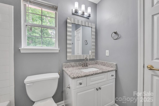 8120 Vermilion Dr, Charlotte, NC 28215 - full bathroom featuring vanity, toilet, and baseboards