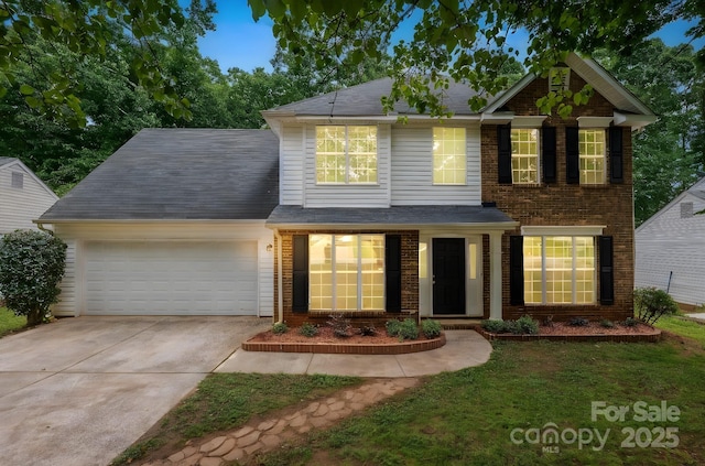 8120 Vermilion Dr, Charlotte, NC 28215 - view of front facade with a garage, brick siding, and driveway