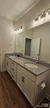 320 Lawrence Gray Rd, Charlotte, NC 28262 - full bath featuring double vanity and wood finished floors