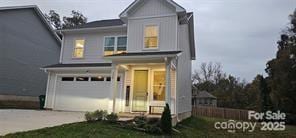 320 Lawrence Gray Rd, Charlotte, NC 28262 - view of front facade featuring concrete driveway and a garage