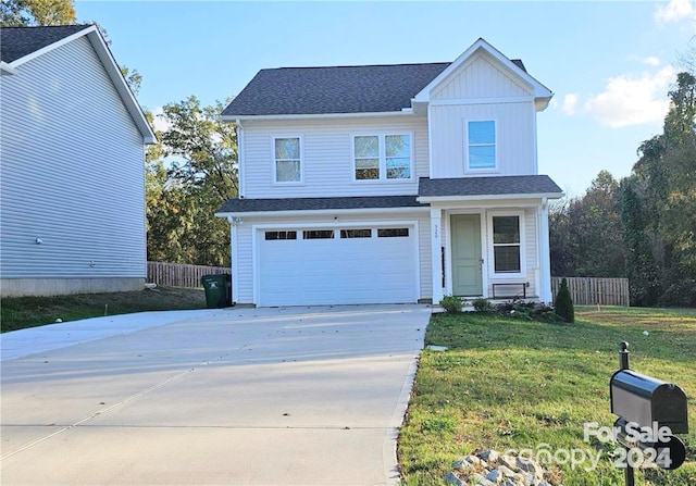320 Lawrence Gray Rd, Charlotte, NC 28262 - traditional-style home with driveway, a garage, and a shingled roof