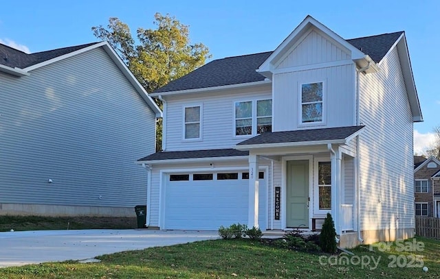 320 Lawrence Gray Rd, Charlotte, NC 28262 - traditional home featuring an attached garage, driveway, and a shingled roof