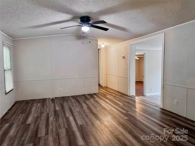 1145 Daniel Rd, Mocksville, NC 27028 - unfurnished room with ceiling fan, wood finished floors, a textured ceiling, lofted ceiling, and ornamental molding