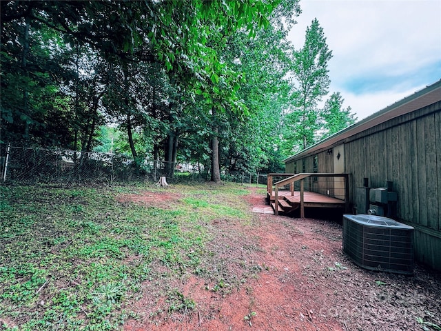 1145 Daniel Rd, Mocksville, NC 27028 - view of yard featuring central air condition unit and a wooden deck
