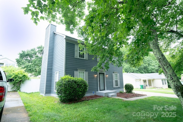 8125 Sheringham Way, Charlotte, NC 28227 - colonial-style house featuring a chimney