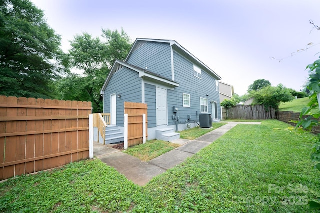 8125 Sheringham Way, Charlotte, NC 28227 - back of property with central AC unit and entry steps