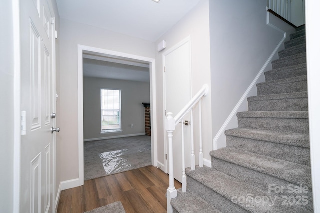 8125 Sheringham Way, Charlotte, NC 28227 - stairs featuring wood finished floors and baseboards