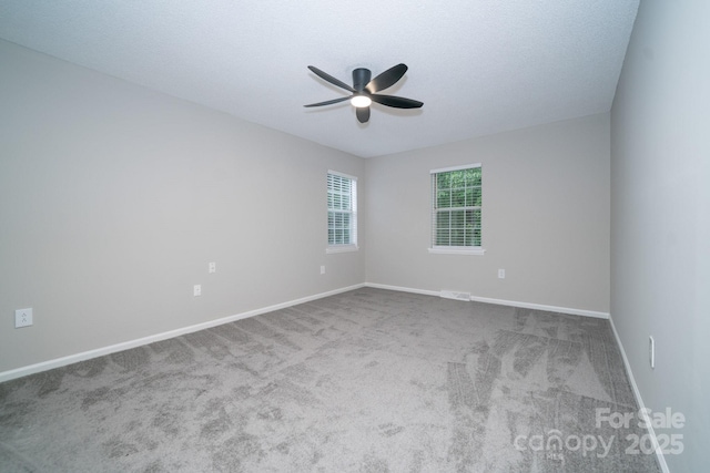 8125 Sheringham Way, Charlotte, NC 28227 - unfurnished room featuring a ceiling fan, carpet flooring, and baseboards